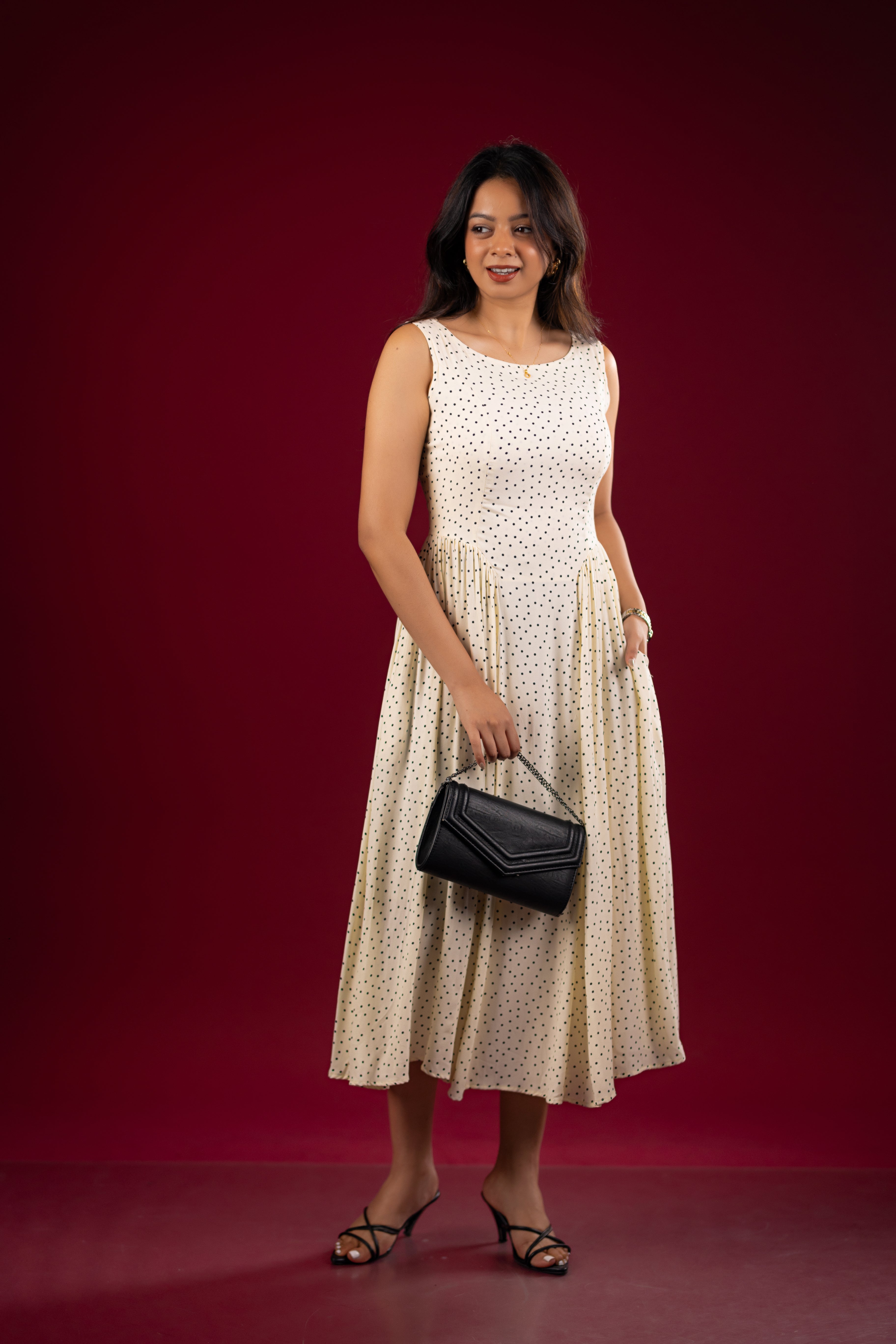 The Ivory Polka Dot Pleated Midi